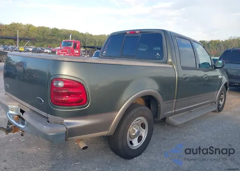 2002 Ford F-150 Lariat/Xlt z USA, uszkodzony, nr VIN 1FTRW07LX2KA56458